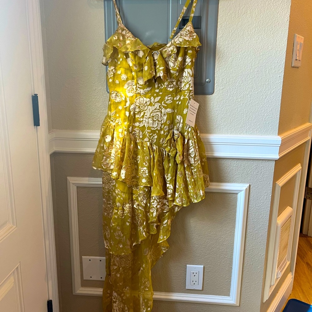 For Love and Lemons Women’s size S Asymmetrical Cosmo Dress.